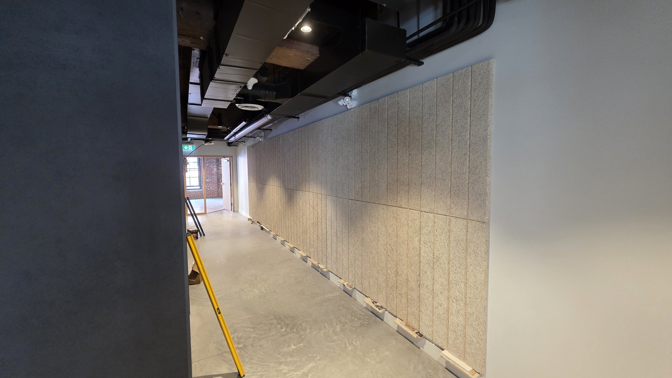 Completed Tectum acoustic wall-panel installation at 837 Beatty Street in Vancouver. Completed Tectum acoustic wall-panel installation at 837 Beatty Street in Vancouver.