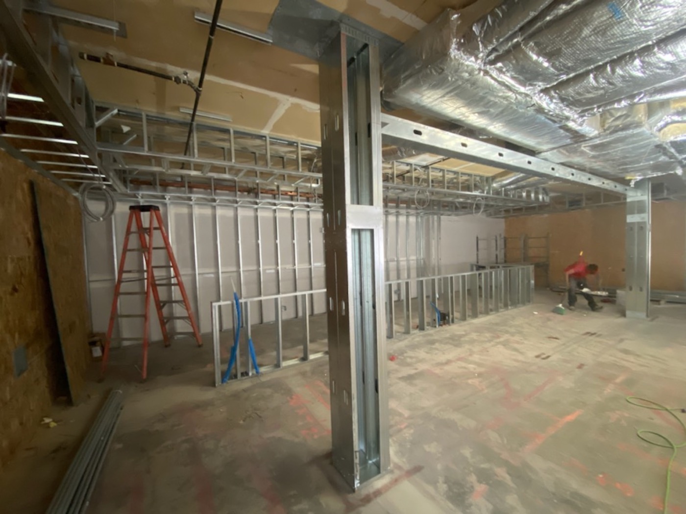 Wide view of steel stud partitions on a commercial construction floor. Wide view of steel stud partitions on a commercial construction floor.